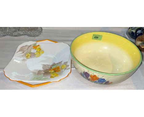 A circular fruit bowl by Wilkinson's decorated with crocus in the Clarice Cliff manner; a 1930's bread and butter plate by Sh