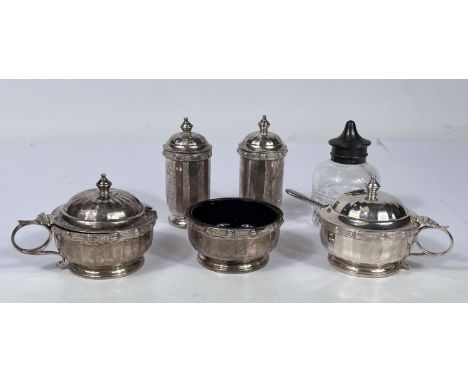 A hallmarked silver 5 piece circular cruet set, Birmingham 1935