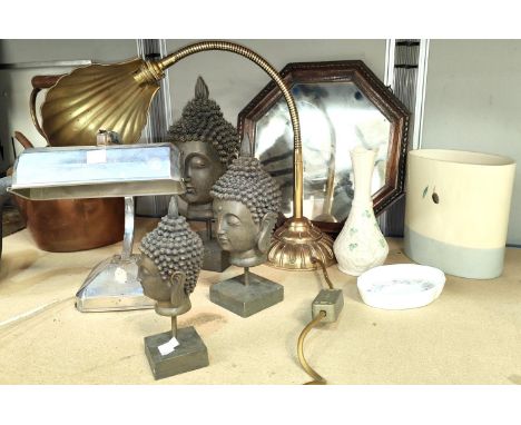 A Chrome vintage desk lamp, a brass shell lamp and graduating modern buddha heads 