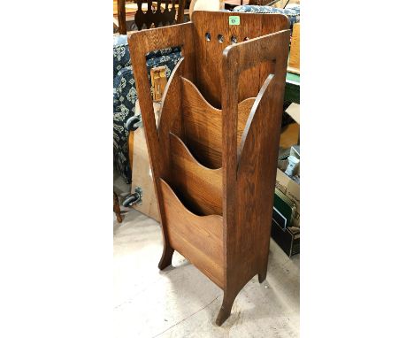 An oak Art Deco magazine stand, a wall hanging shelf unit and a folding chair 