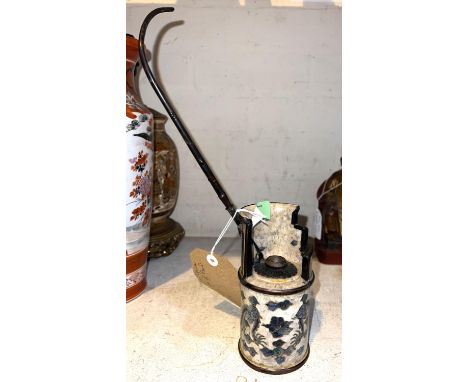 An unusual Chinese opium pipe, ceramic set with mother of pearl and metal mounts 