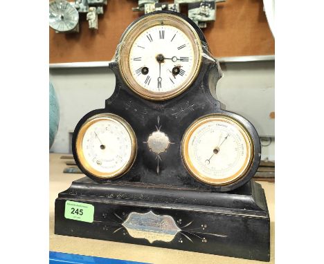 A PRESENTATION SLATE CASED CLOCK, with 8 day movement, thermometer and barometer dials, 27cm high with dedication to an RSM o