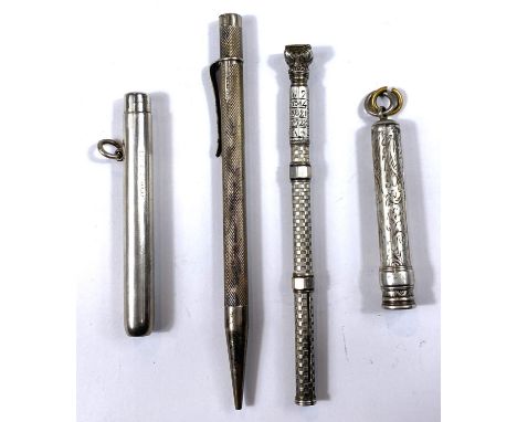 A silver propelling pencil with seal top, calculator and other silver propelling pencils 