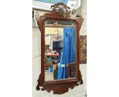 A wall mirror in Chippendale style fretwork frame, width 105cm; a similar mirror 