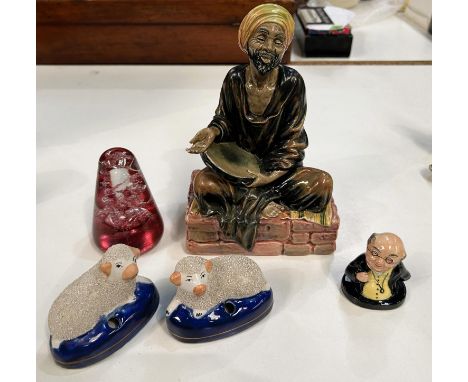 Royal Doulton figure 'Mendicant' H.N 1365 and a Doulton Mr Pickwick, two Staffordshire style sheep and a Caithness paperweigh