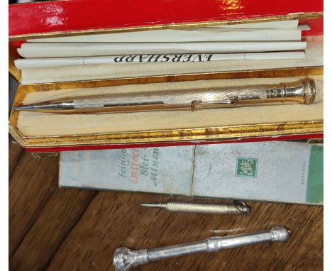 A selection of silver and gilt pencils etc 