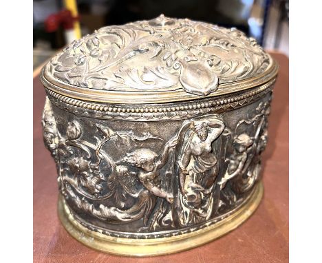 Attributed Elkington, an Art Nouveau silver on copper oval jewellery casket, stylised embossed depictions of ladies and cheru