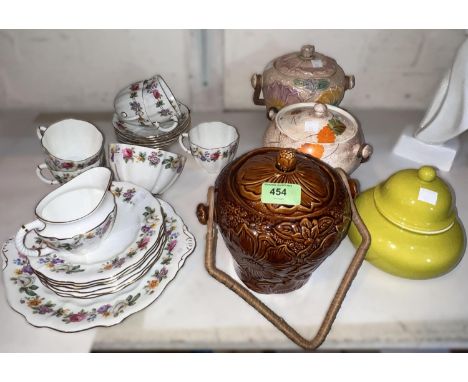 A Royal Crown Derby unusual 20 piece tea set in the Melody pattern, cups, saucers, milk etc; a Carlton ware ginger jar and 3 