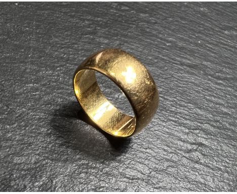 A 22ct hallmarked gold 'D' shaped wedding ring size G, 5.8gms 