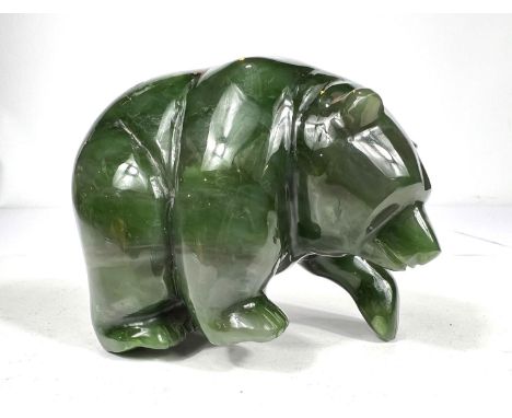 A Nephrite Jade carved bear with etched marks to feet length 10cm 