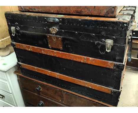 A 19th century wood bound cabin trunk 