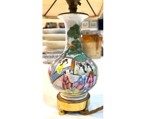 A Chinese famile verte lamp with brass fittings 