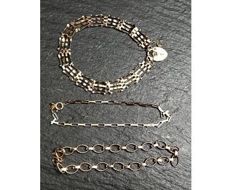 A 9ct hallmarked gold gate bracelet, a 9ct hallmarked gold bracelet formed from open oval links and another chain bracelet, 9