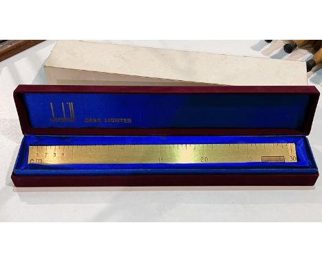 A DUNHILL TWELVE INCH RULER & Desk Lighter, gilt brass, original box and packing c. 1970 In good condtion with a small knock 