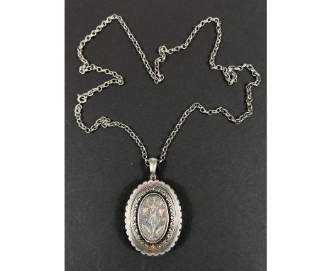 An Edwardian silver locket, gold colour inlay with later silver chain, 26gm 