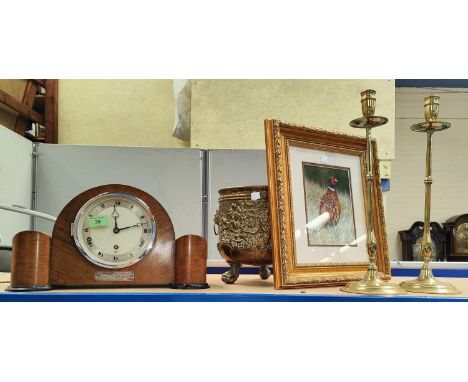 An Art Deco wall clock with chime, in walnut case; a brass jardinière; a pair of tall brass candlesticks; a coloured print of