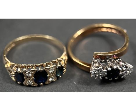 A 9ct hallmarked gold gypsy style ring set with 3 sapphires, 2 diamond chips between each sapphire, size O; a similar gold ri