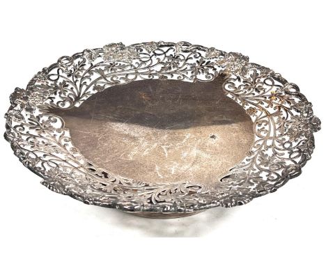 A hallmarked silver shallow pedestal dish with floral pierced border, on circular foot, Sheffield 1936, diameter 21cm, 16.7oz