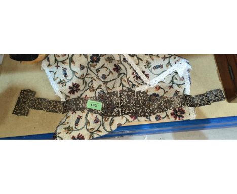 A silver plated Art Nouveau belt with pierced decoration, a square of floral tapestry fabric 