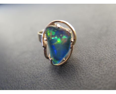 A 9ct yellow gold and opal dress ring size P/Q - approx weight 5 grams - light usage wear