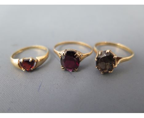 Three 9ct yellow gold rings - sizes P, Q and K - approx total weight 5.7 grams - varying conditions