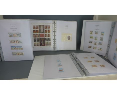 A collection of 194 different vintage luggage labels in a folder
