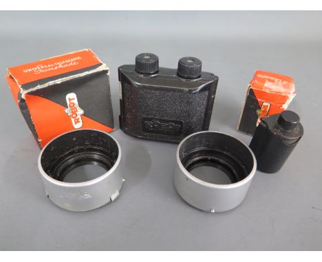 A small collection of four items for Robot cameras including hoods, film loader and boxed cassette