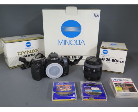 A Minolta Dynax 50051 camera with an AF28-80 lens and three filters - boxed