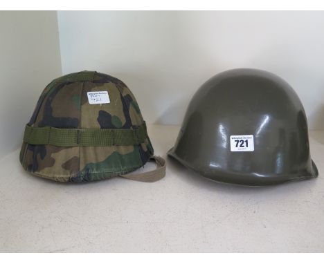 A Bosnian helmet with cover and Hungarian leather pad