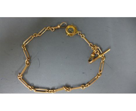 A 9ct yellow gold watch chain - Length 38cm - with compass - broken - approx total weight 38 grams
