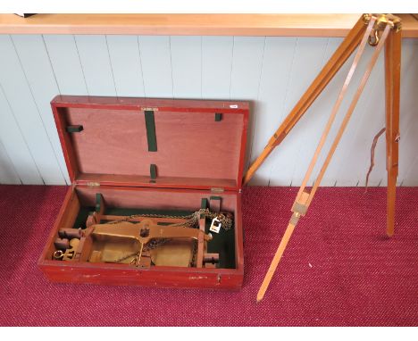 A set of WWII Royal Ordnance brass scales circa 1940 number 4343 in a mahogany case with tripod stand