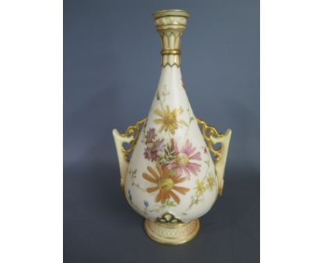 A twin handled Worcester vase decorated with floral design on cream ground, the twin handles top and bottom in blush ground a