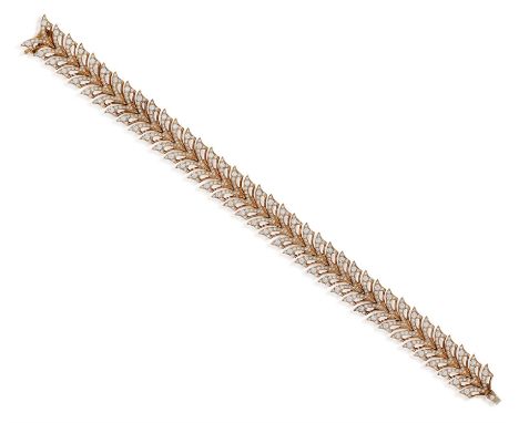 A DIAMOND 'OPEN PLUME MAGNIPHEASANT' BRACELET, BY STEPHEN WEBSTERDesigned as articulated pheasant's feathers links, pavé-set 