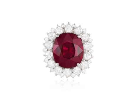 A FINE RUBELLITE AND DIAMOND DRESS RINGThe cushion-shaped rubellite weighing approximately 8.50cts within a four-claw setting