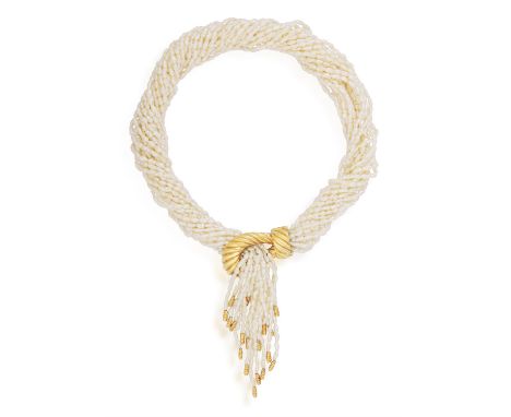 A FRESHWATER GOLD AND PEARL NECKLACEOf torsade design, the eighteen rows of fresh-water pearls centring a fluted gold motif s