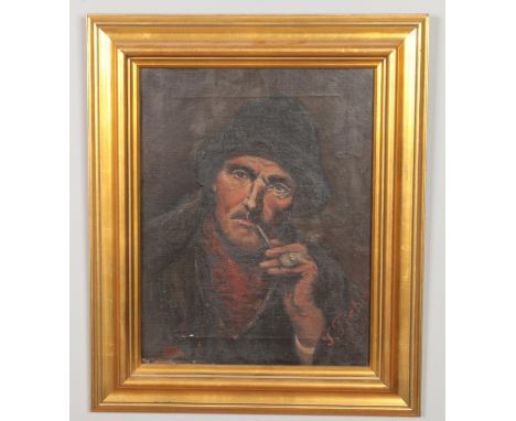 A 19th century gilt framed oil on canvas, portrait of a fisherman smoking a pipe, signed J Fisher, 1893. 37cm x 29cm.  Repair