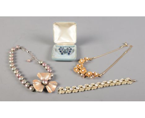 A small collection of designer costumer jewellery, to include a pair of paste earrings by Christian Dior (Mitchel Maer), Coro
