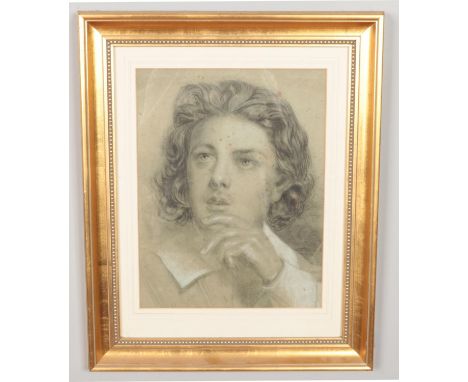 A 19th century gilt framed charcoal portrait of a gentleman. 36cm x 28cm.  Some foxing to paper.