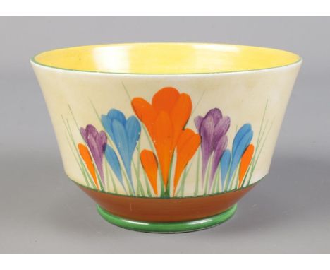 A large Wilkinson Ltd Clarice Cliff sugar bowl in the Autumn Crocus design. Diameter 12.5cm.  Good condition.