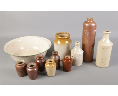 A box of assorted stoneware ink bottles and jars with an enamel basin etc.  