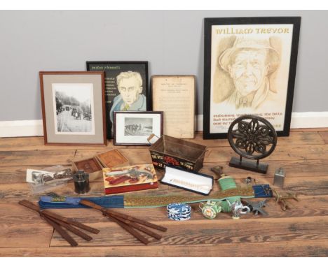 A box of miscellaneous. To include two portrait carvings, an Arabian Jambiya knife and belt sheath, postcards, a boxed set of