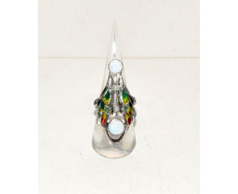 A silver and plique a jour Art Nouveau style ring with opal panels