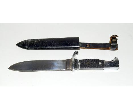 A German dagger by Linder-Messer in its metal scabbard. Blade length 14cms