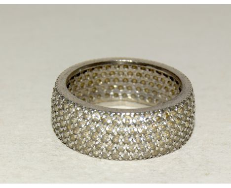 Silver fashion ring with inset stones test diamond size O