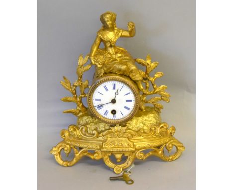 French figural gilt clock with key, in working order