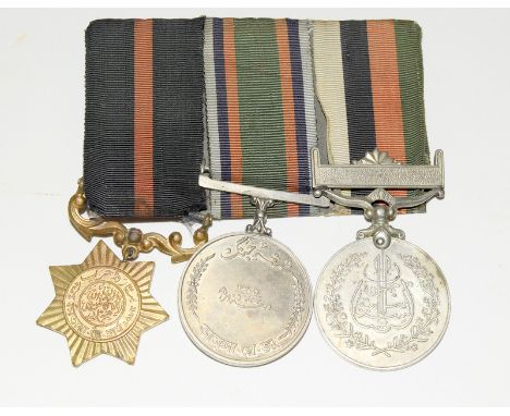 A mounted Pakistan Army medal group with the Star being named to 6257679 CQMH MOHD ROSHAN. SIGNALS