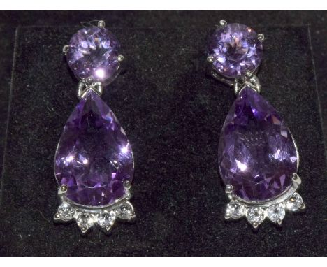 An impressive pair of silver CZ  and amethyst drop earrings