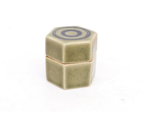 Marianna Franken (1928) A green glazed hexagonal stoneware box and cover, the cover with blue linear pattern, the inside blue