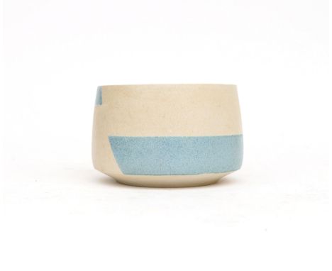 Barbara Reisinger (1955) A porcelain bowl, grey glazed with blue bands, signed with monogram underneath, minor chip to top ri