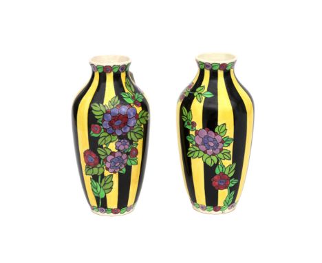 Charles Catteau (1880-1966) Two black and yellow glazed ceramic vases decorated with branches of flowers, produced by Boch Fr